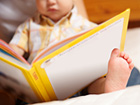Reading aloud is fun for the children and for the reader.  Photo: MariyaL © iStockphoto 